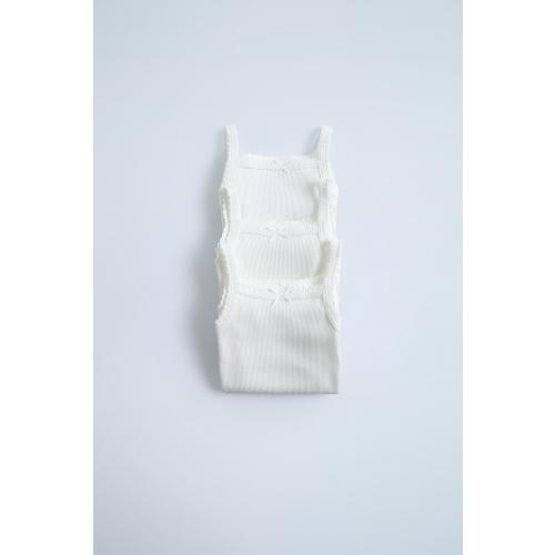 THREE-PACK OF RIBBED STRAP BODYSUITS - Oyster-white | ZARA United States