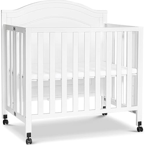 DaVinci Charlie Folding Portable 3-in-1 Convertible Mini Crib and Twin Bed in White, Removable Wheels, Greenguard Gold Certified
