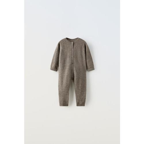 STRIPED OVERALL SHORTS100% CASHMERE JUMPSUIT100% CASHMERE WRAP JUMPSUIT