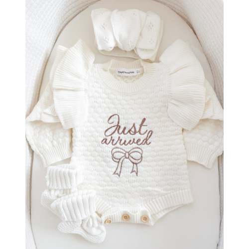 “Just Arrived” Ruffle Knit Onesie