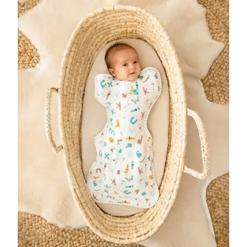Swaddle Up™ ECOVERO™ Moderate Alphabet Soup Small US Love To Dream