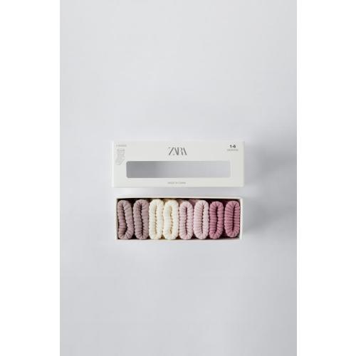 FOUR-PACK OF COLORFUL SOCKS