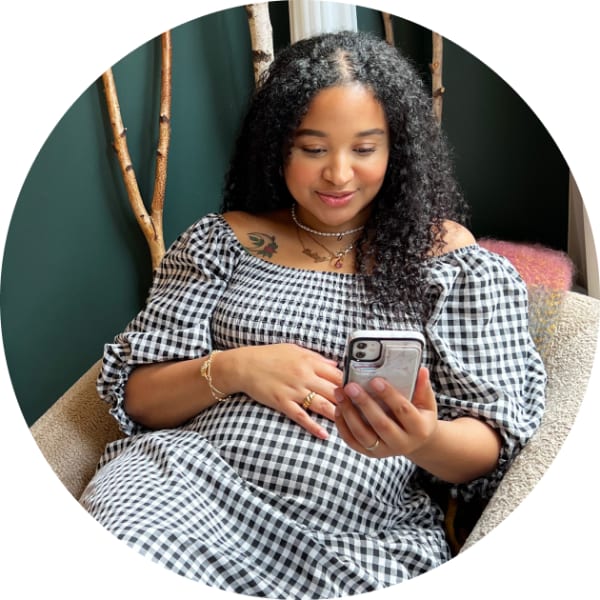 pregnant person on iphone