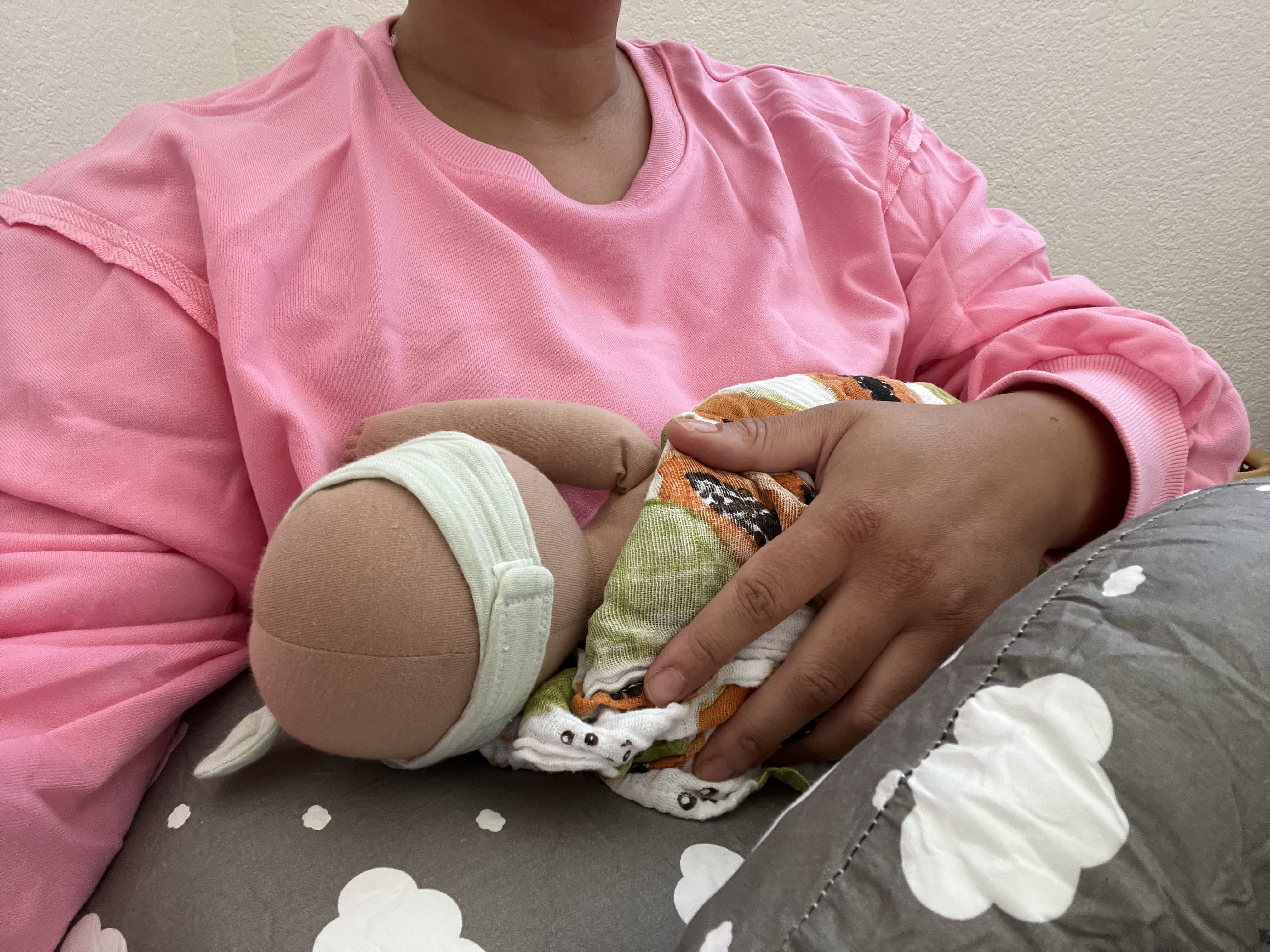 Demo photo of the Momcozy Nursing Pillow.