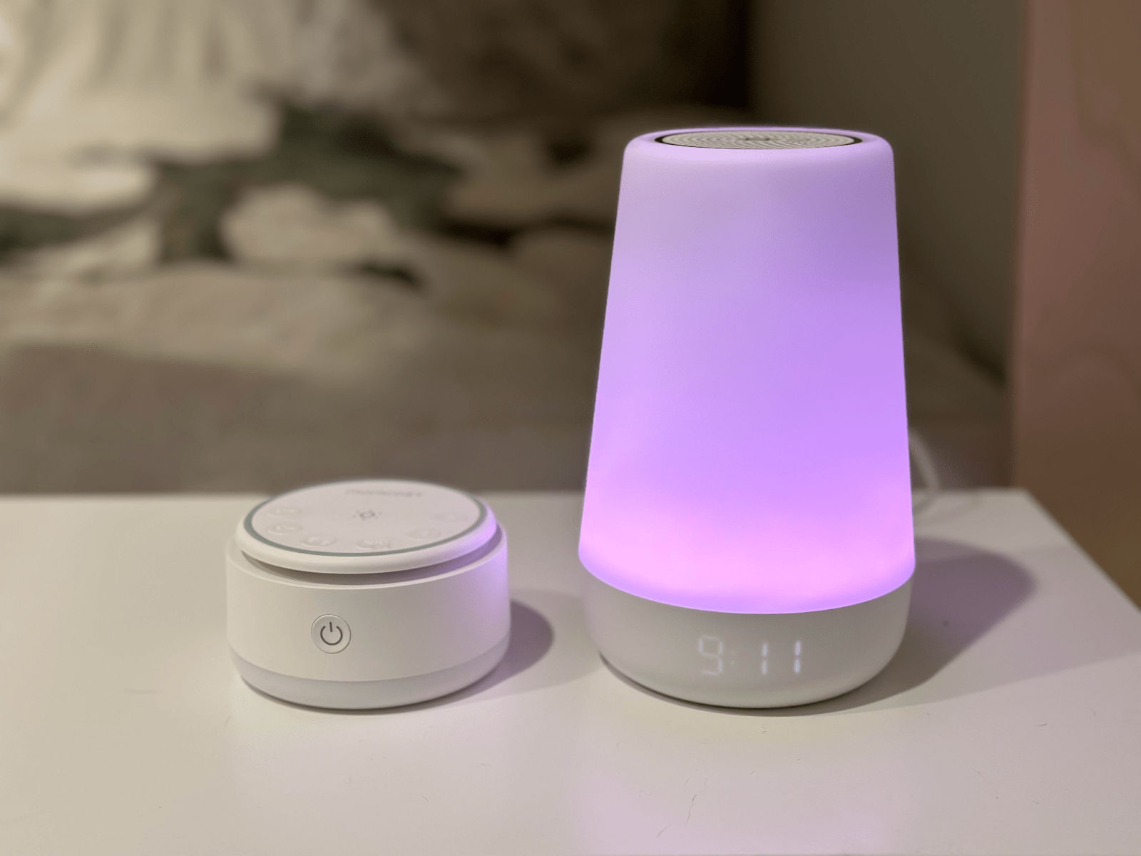 Momcozy Portable White Noise Machine in use.