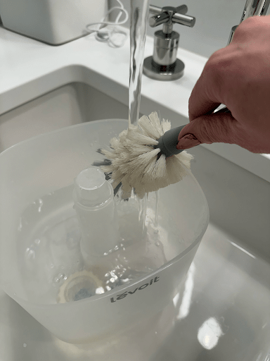 Filling up the LEVOIT Top Fill Humidifier.