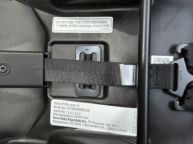The date of manufacture and expiration information can be found on labels on the bottom of this Nuna Pipa Aire Rx infant car seat.