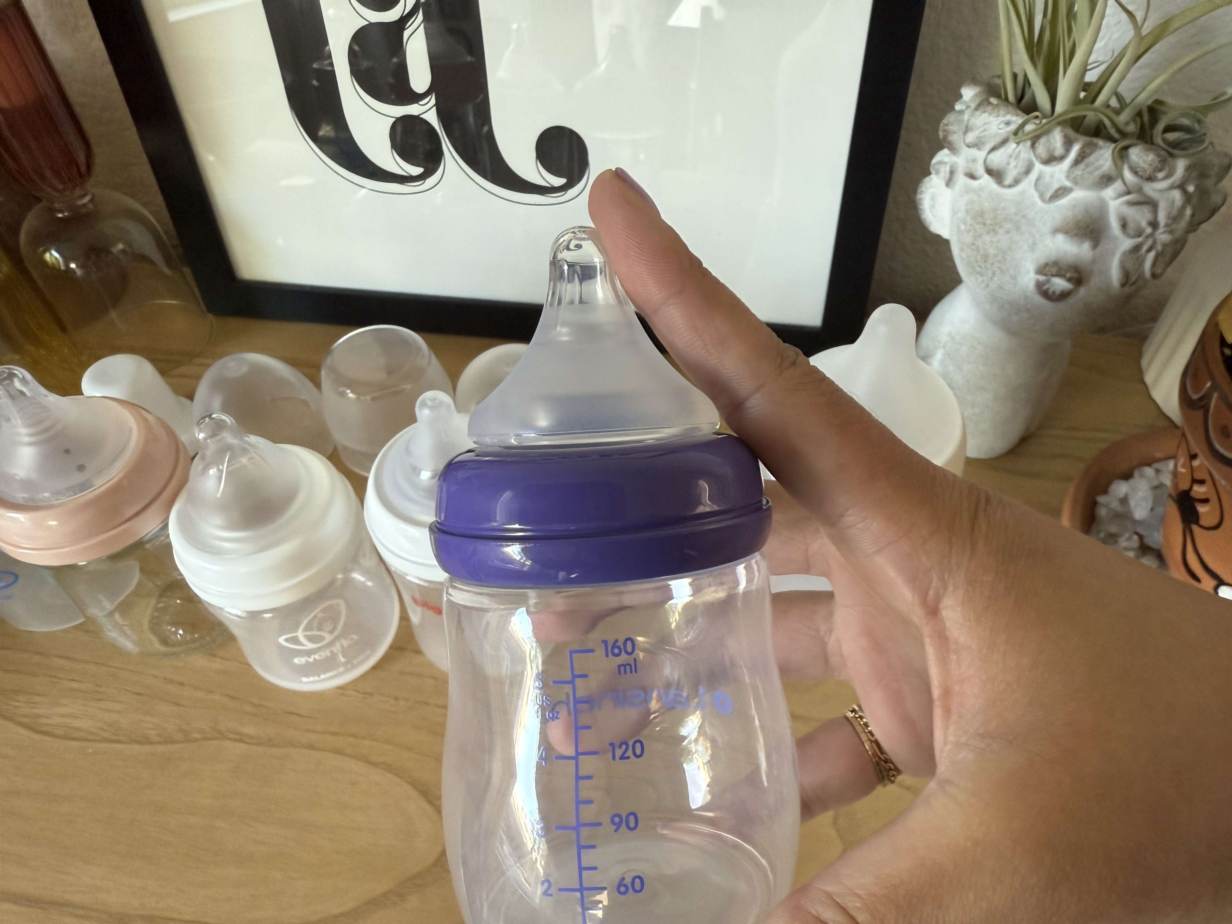 A one-handed example of the triangle test on the Lansinoh Bottle nipple.