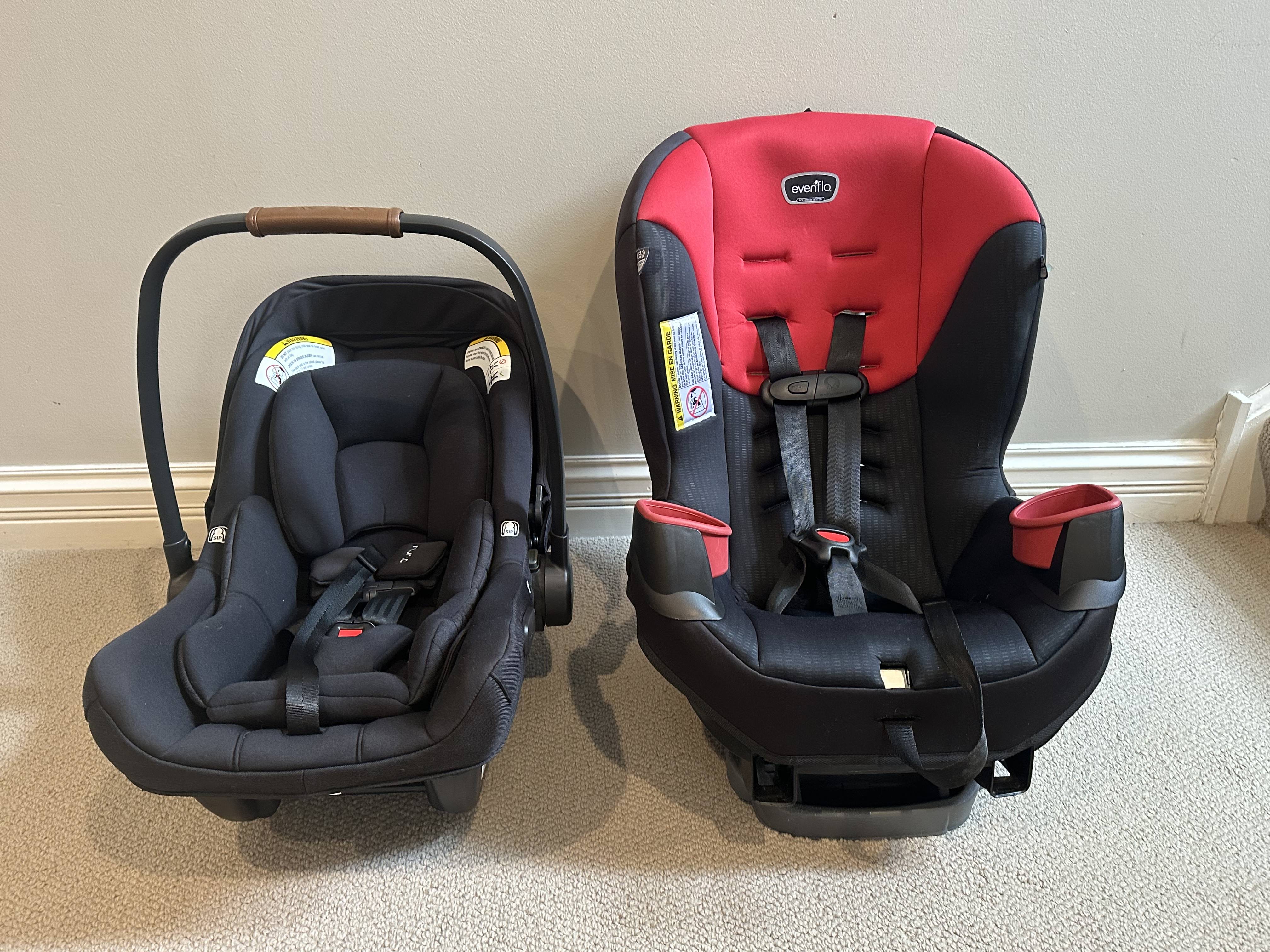 An infant car seat (Nuna Pipa aire rx) pictured next to a convertible car seat (Evenflo Sonus 65).