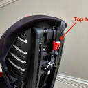 The top tether on the rear of an Evenflo Sonus 65 Convertible Car Seat. thumbnail.