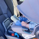 A close up of the anti-rebound panel on the UPPAbaby Aria Lightweight Infant Car Seat. thumbnail.