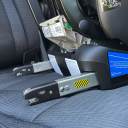 A close-up shot of the rigid LATCH extending from the rear of the Clek Foonf Convertible Car Seat. thumbnail.