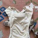 Front view of the Ergobaby Embrace carrier thumbnail.