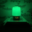 Hatch Baby illuminated with the green light setting.  thumbnail.