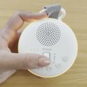 A video of a hand adjusting the rolling volume button on the Sprucely Travel Sound Machine thumbnail.