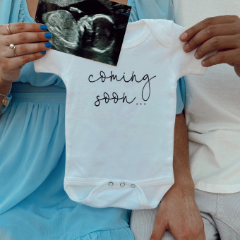 Kirsten & Brennan's Baby Registry Photo.
