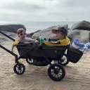 Evenflo Pivot Xplore All-Terrain Stroller Wagon on Beach Terrain thumbnail.